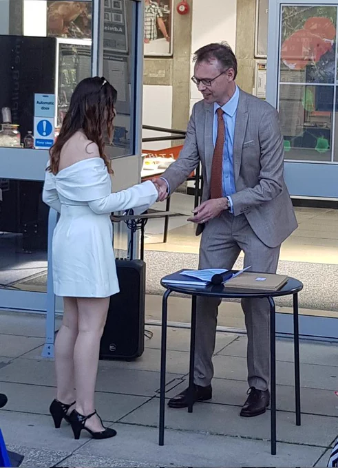 Nikoleta Koleva receiving from Head of the Biological Sciences Department James McEvoy the Bramley Prize to the best project in Biochemistry