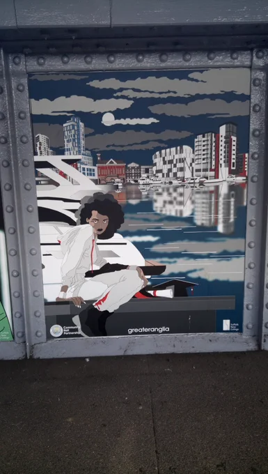Poster showing stylish young person by Ipswich waterfront at dusk