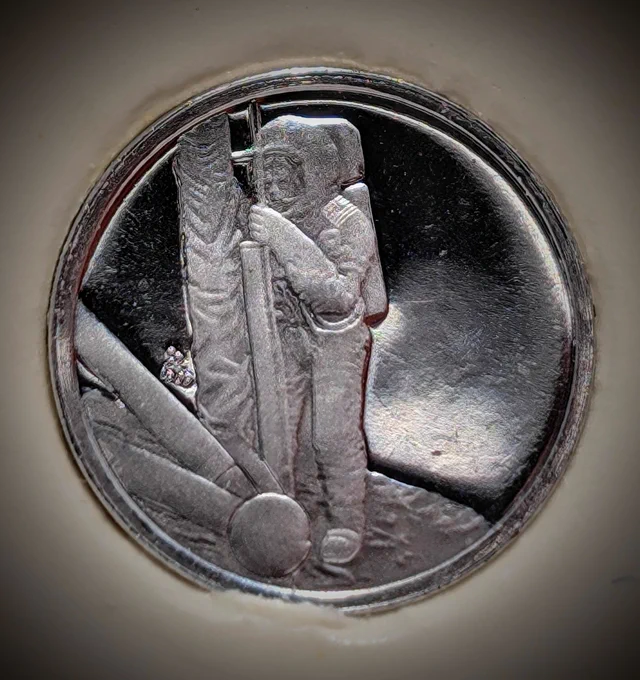 1 g solid Platinum commemorative coin celebrating the first step on the moon. 