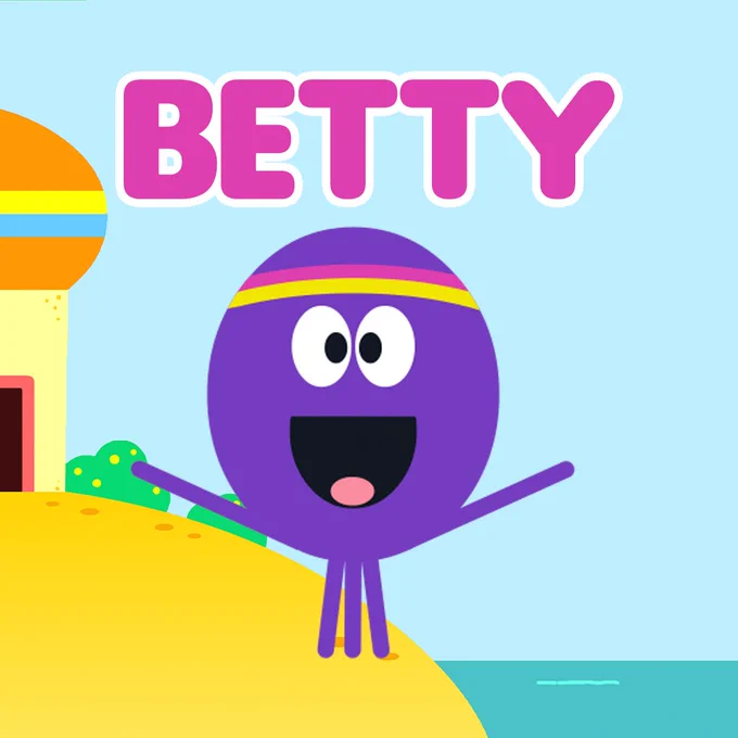 Betty standing in front of her house with her name in bold pink above her head