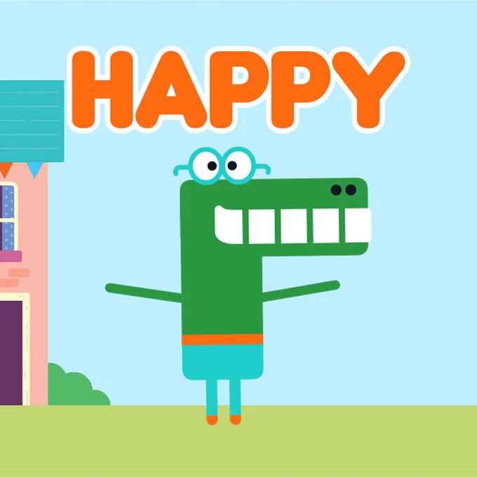 Happy standing in front of his house with his name in bold orange above his head