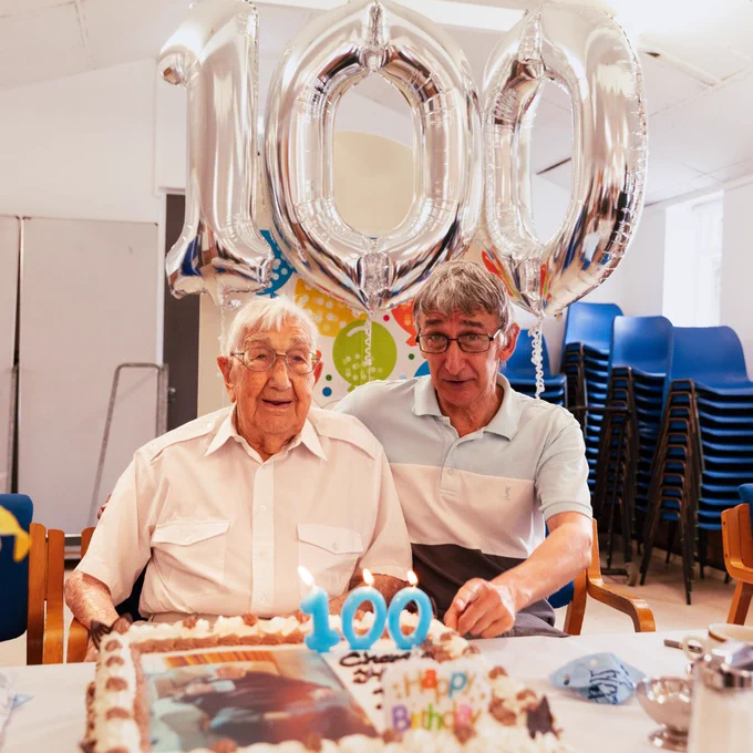 Charlie Hatfield and his son Malcolm at his 100th birthday celebrations, at Age UK Ealing's Wellbeing Day Centre