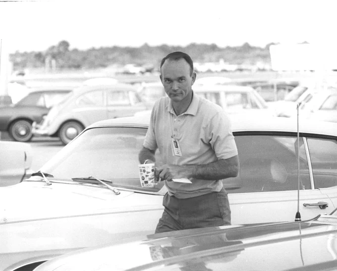 Apollo 11 astronaut Michael Collins carries his coffee through a parking lot as he arrives at the flight crew training building of the NASA Kennedy Space Center (KSC) in Florida, one week before the nation’s first lunar landing mission. 5 years ago today he tweeted: "One week before the launch. Coffee was mandatory. My faithful VW Beetle in the background.”