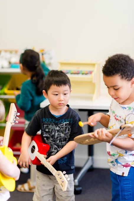 children playing in the music toy library