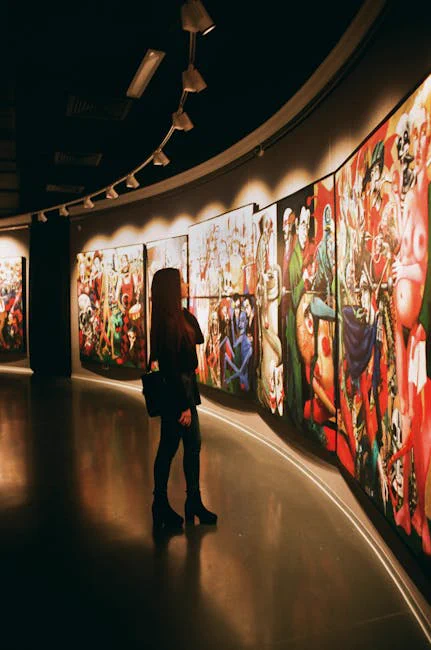 Person Standing Near Paintings