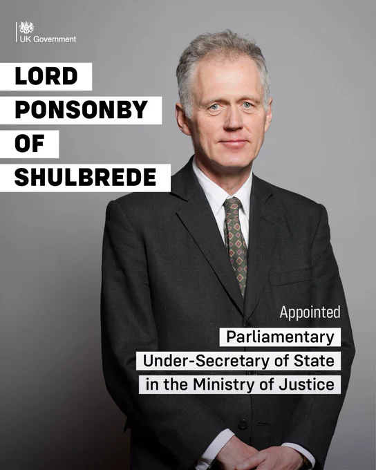 A grey-haired man in a charcoal suit stands against a grey backdrop. Text across the image reads: Lord Ponsonby of Shulbrede appointed Parliamentary Under-Secretary of State in the Ministry of Justice.