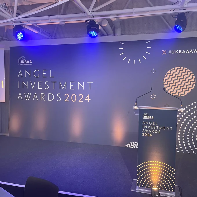 A photo of the podium and stage at UK Business Angels Association's Angel Investment Awards 2024.
