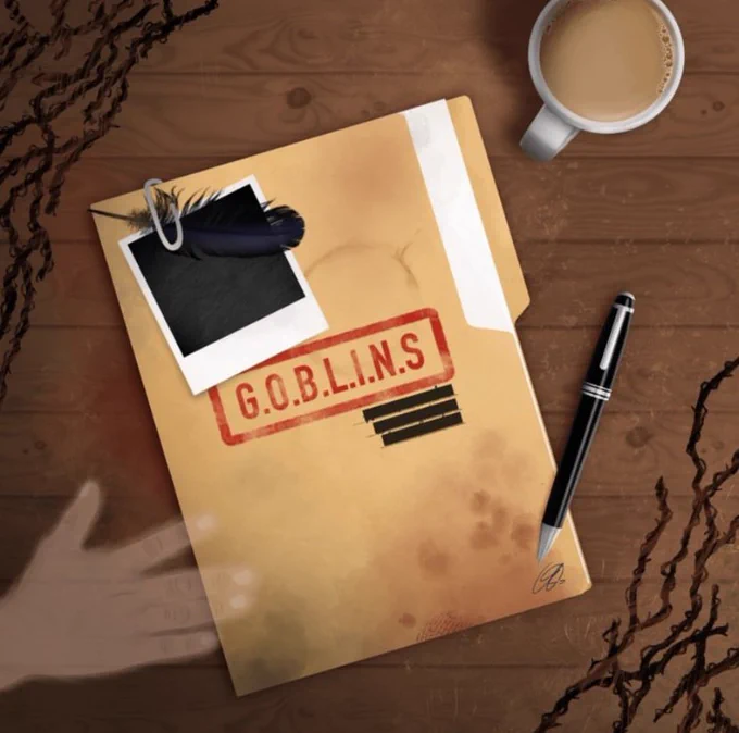 art by @cloudyappleart ! a drawing of a stained folder on a wooden desk. the word ‘GOBLINS’ is stamped in red on the folder, and there is some redacted text underneath. an undeveloped polaroid and a black feather is paperclipped to the top of the folder. there is a cup of tea and a pen next to the folder. dead vines go across the top left and bottom right of the image. in the bottom right hand corner, a transparent hand reaches for the folder.