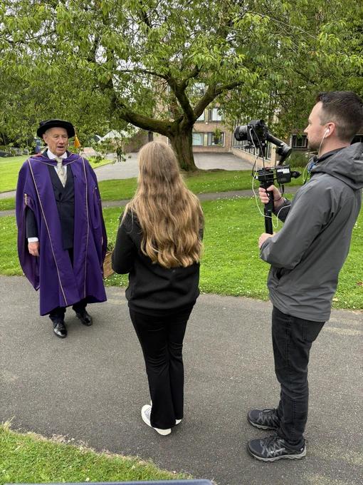 Newcastle College student Loren interviewing honorary degree recipient, Rick Parry.