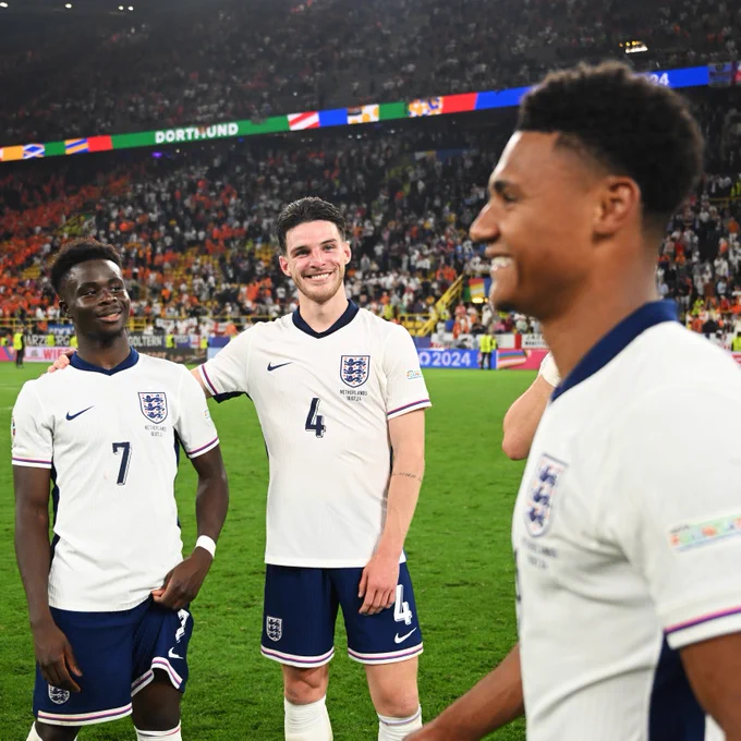 Declan Rice smiling at winning goalscorer, Ollie Watkins at full-time. 