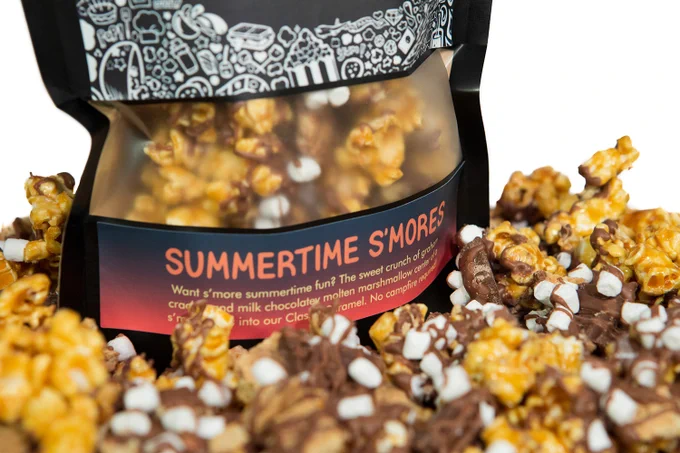 A bag of Summertime S'mores sits in its popcorn.