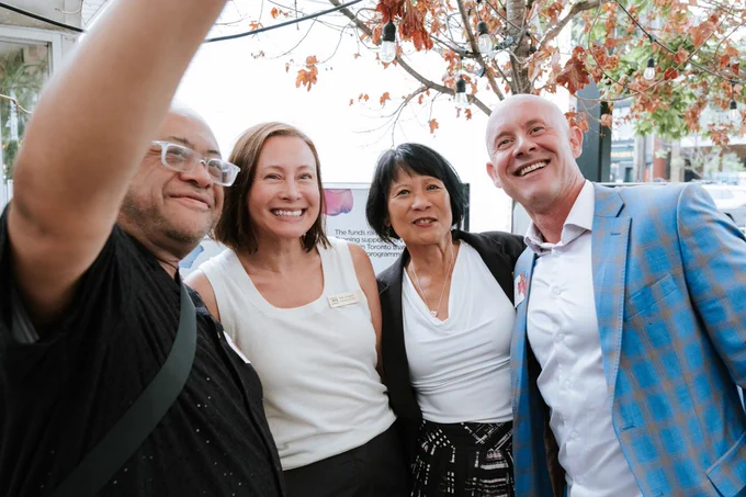 Mayor Olivia Chow takes a photo with Kelly Langgard, Director & CEO of the Toronto Arts Council, and other event attendees.