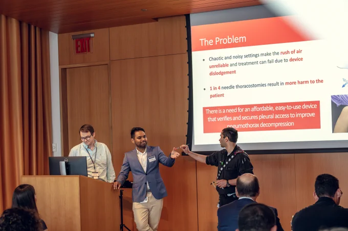 HTA 2023 EZ-NT Team presents to Demo Day Audience (speakers' names left to right: Nicholas Benson, Neil Ray, Jonathan Bar).