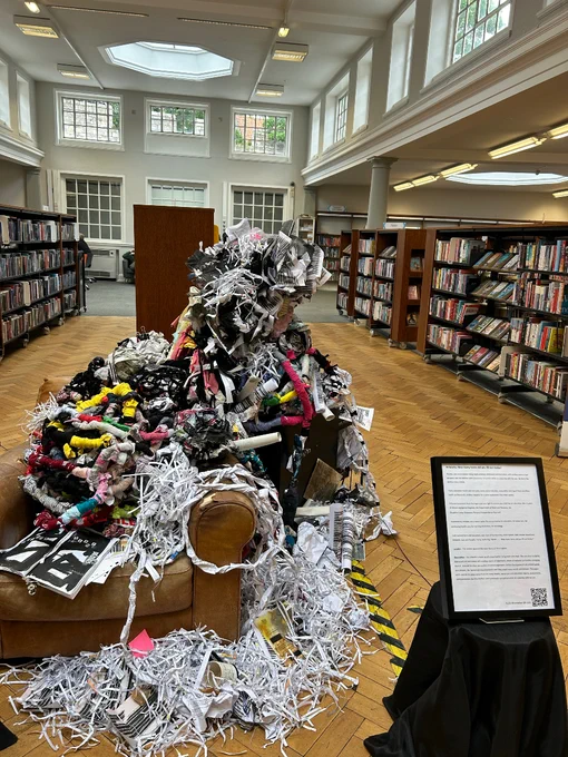 Kerry Fox's artwork. A chair with reams of paperwork coming out of it.