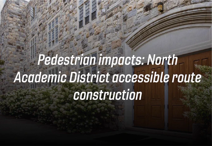 Grey Hokie Stone Burruss Hall featuring white hydrangeas. The words "Pedestrian impacts: North Academic District accessible route construction" are overlayed on top. 