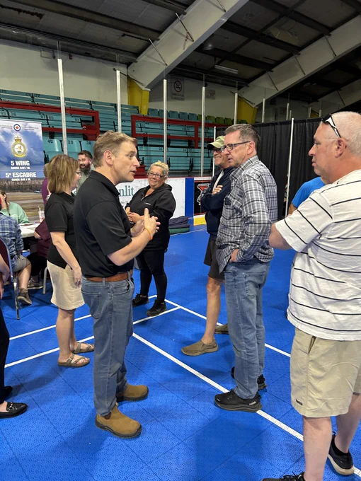 Premier Furey speaking to some evacuees. 