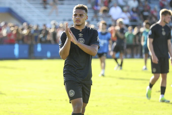 Max Aarons thanking the crowd for their support at Harder Stadium. 