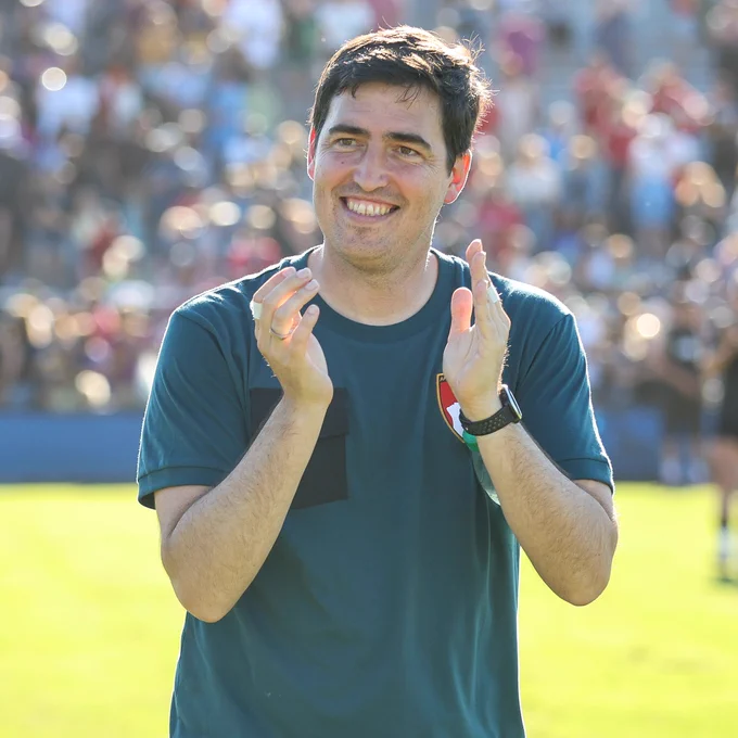 Andoni Iraola thanking the crowd for their support at Harder Stadium. 