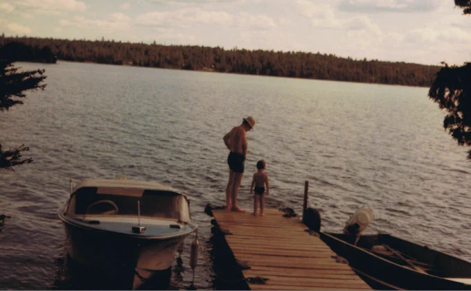 My grandfather and I at his cottage when I was still very wee. That's the same dock in each of the other photos. 