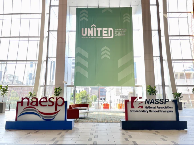 The marquee sign for the UNITED conference 