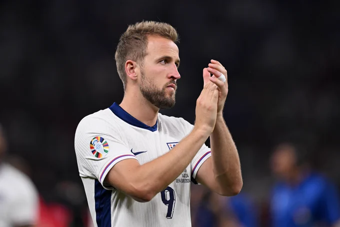 Harry Kane applauds the England fans after the game.