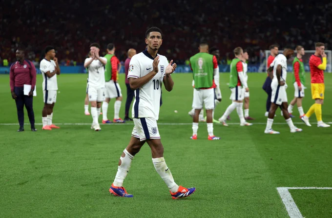 Jude Bellingham applauds the England fans after the game.