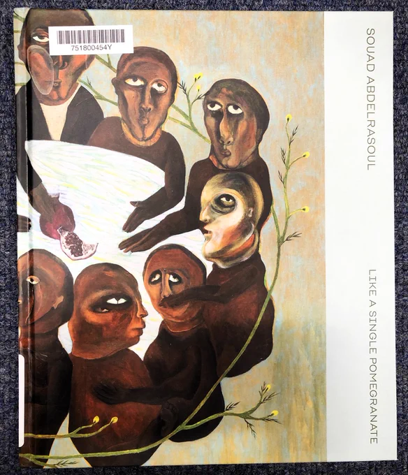 The cover of the book "Like a Single Pomegranate" by artist Souad Abdelrasoul. The cover features a painting in which seven abstract figures sit around a table gesturing towards a pomegranate which is placed in the middle of the table. Surrounding the figures a vine with flowers on winds around the group. 