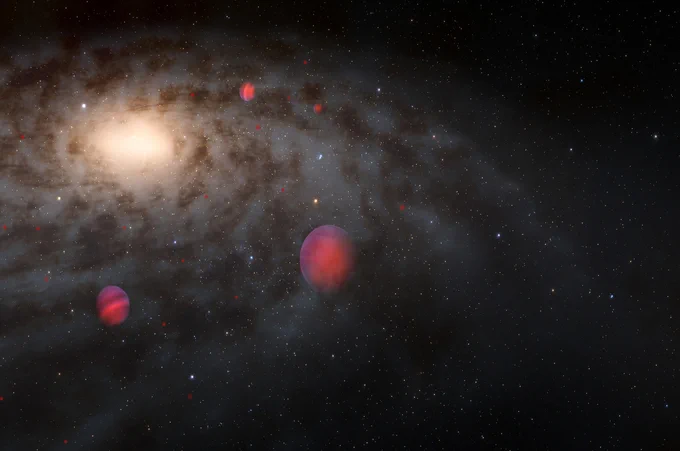 An illustration of several faint brown dwarfs surrounding a galaxy, viewed from a perspective slightly above the disk. The galaxy occupies the upper left quadrant of the image as a glowing disk extending out of view. The galaxy’s center is a bright yellow glow in the upper left. The bright center rapidly fades to a more subtle glow in the outskirts of the galaxy. Dark dust clouds spiral outward from the center and obscure some of the glow. Two fully illustrated brown dwarfs are visible at the center of the image and to the left, glowing red-orange and with horizontal stripes representing bands of clouds. Several reddish points of varying sizes dot the galaxy farther away, representing the ancient brown dwarfs that could be detectable by Rubin Observatory. The background is black sprinkled with the white pinpricks of distant galaxies.