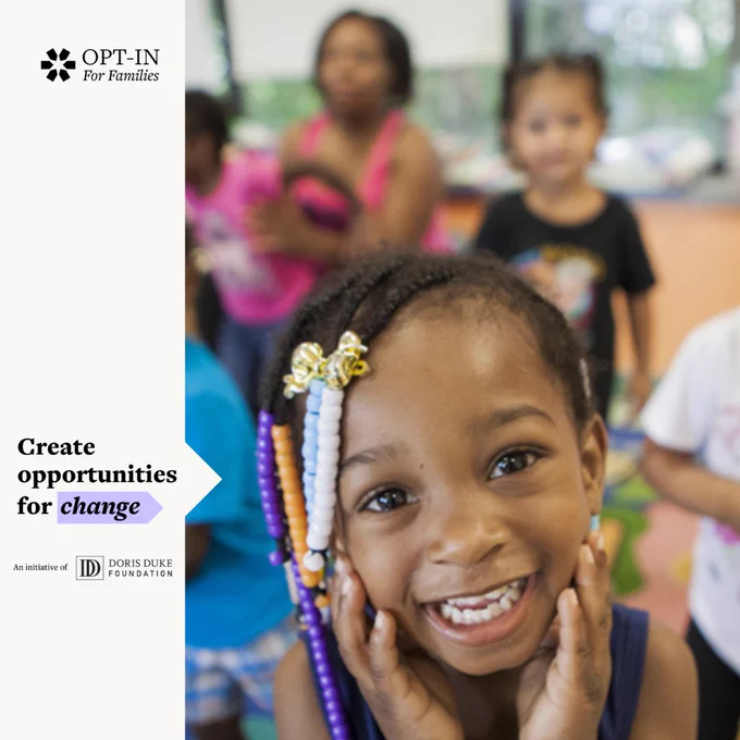 A young girl with colorful beads in her hair smiles brightly, with other children blurred in the background. The text overlay reads: "Create opportunities for change" with the OPT-In for Families and Doris Duke Foundation logos.