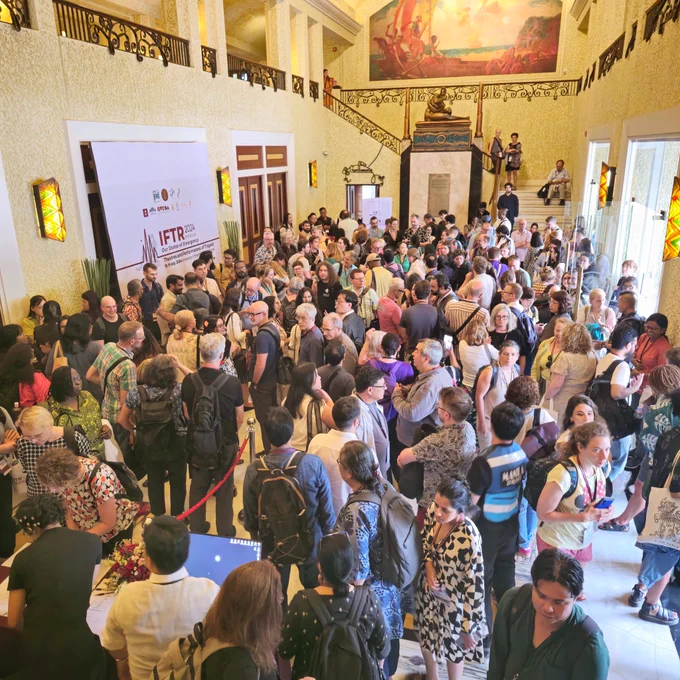 Attendees gather in a foyer for the IFTR 2024 conference in Manila, Philippines