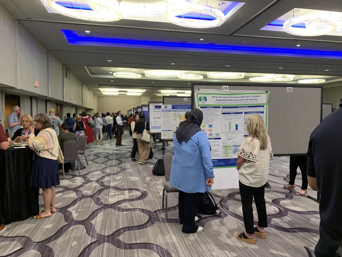 Multiple presenters talk about their posters at the 2024 Noyce Summit.