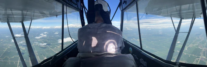 Cory Robin and his airplane “Ghost” high above the Midwest