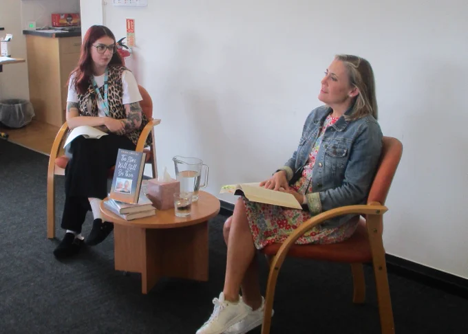 member of staff with author