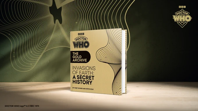 A packshot of Doctor Who: The Gold Archive: Invasions of Earth: A Secret History - a gold covered book with a dynamic swirl pattern on the cover