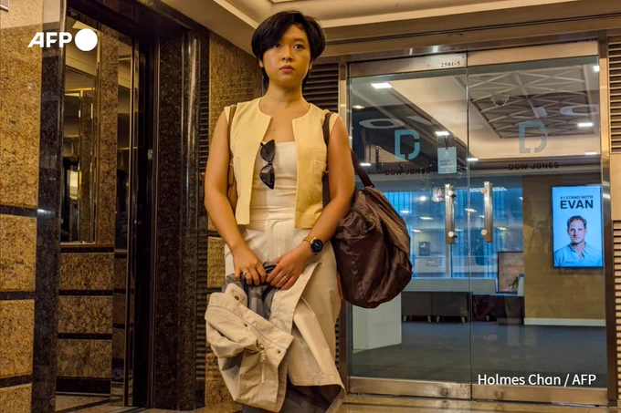 Former Wall Street Journal reporter and chair of the Hong Kong Journalists Association Selina Cheng stands outside the Dow Jones office in Hong Kong on July 17, 2024. Cheng accused the paper of firing her over her role leading a press union and advocating for press freedom in the Chinese city. (Holmes Chan / AFP)
