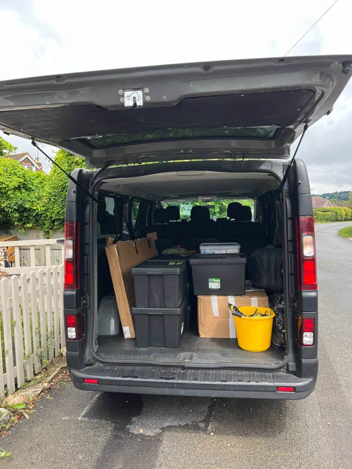 Van packed with camping equipment