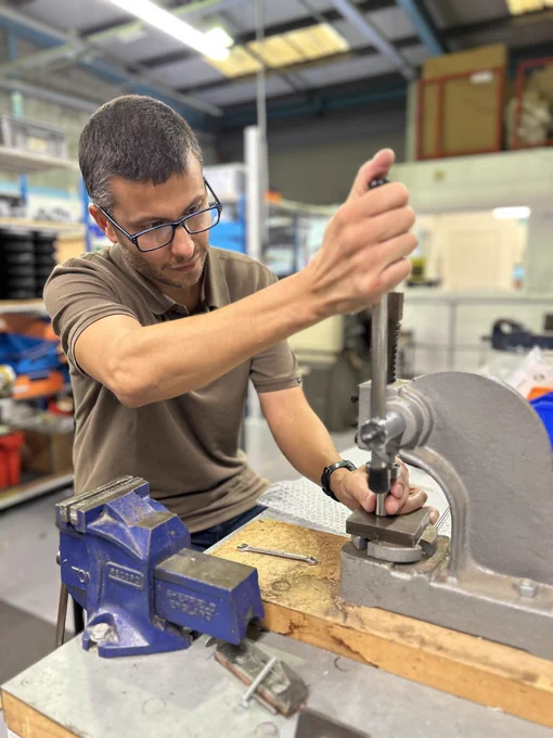 Dario working with some parts in the Designability workshop