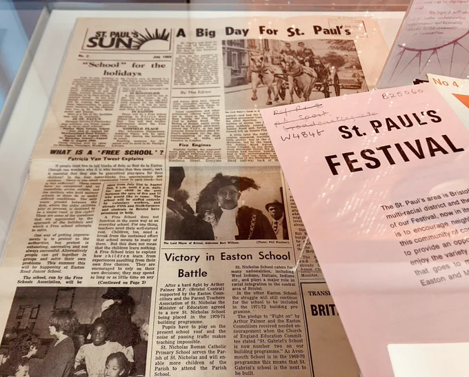 1969 newspaper, St Paul’s Sun, and a 1970 programme for St Paul’s Carnival on display