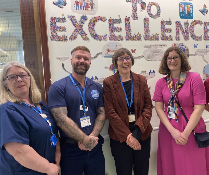 Photo of nurses standing for a team photo at Charing Cross Hospital.