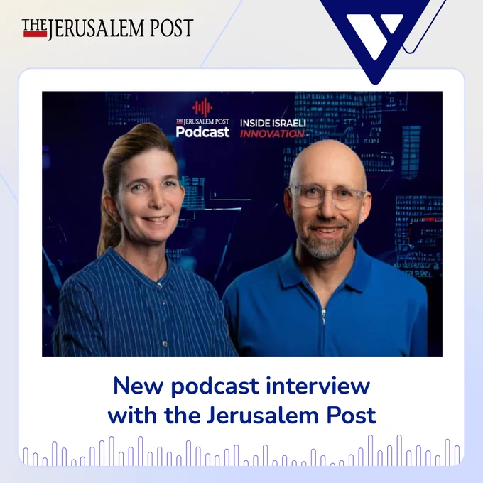 A graphic shows The Jerusalem Post logo and the Verbit V logo in each top corner. Under, Hila Geva, a woman with blonde hair in a ponytail and Yair Amsterdam, a middle aged man with glasses and facial hair, are shown smiling. The bottom reads 'New podcast interview with the Jerusalem Post'