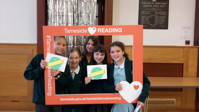 A photo of pupils from St Anne’s Primary School in Audenshaw at the Reading Champions Celebration event at Dukinfield Town Hall.