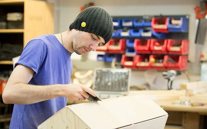 A prop making student working on a prop in the workshop