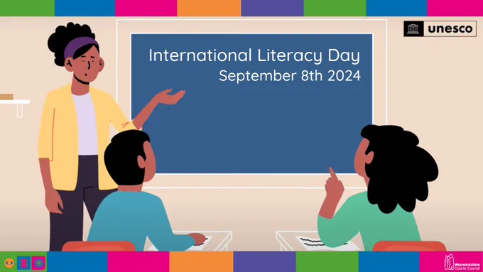 An illustration of a person pointing at a blackboard which says ‘International Literacy Day. September 8th 2024’. There are illustrations of two people at desks facing the blackboard. There are logos for UNESCO, Warwickshire Libraries and Warwickshire County Council