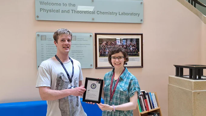 Postdocs Jack and Clare with our new Silver LEAF certificate