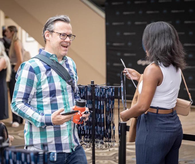 Digital Summit Attendees checking in and networking