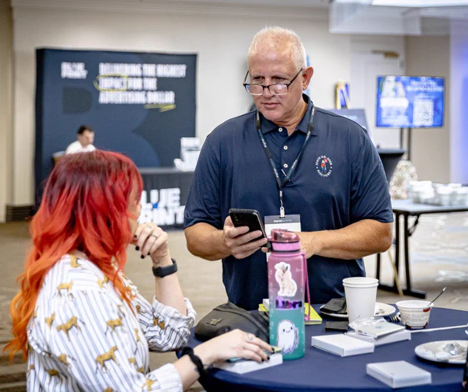 Digital Summit Attendees exchanging information