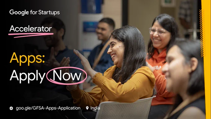 A creative with the logo of Google for Startups on the top left corner with 'Accelerator' written below it
Below this we have the text 'Apps: Apply Now' 
On the bottom left side, we have the like to apply: goo.gle/GFSA-Apps-Application
The location is also mentioned as India

In the background of this text we have an image from the accelerator program with a group of people smiling and clapping