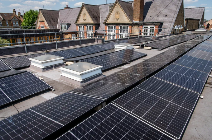 The solar panels at Colvestone School with the school building in the background