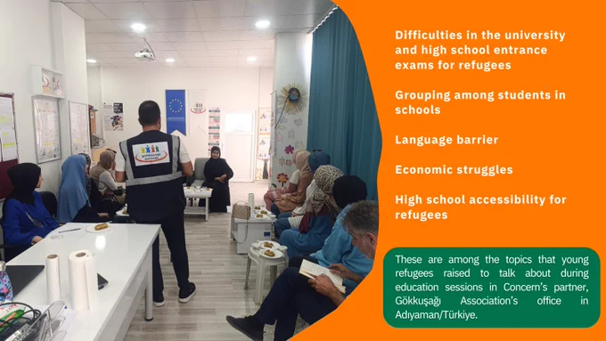 Male and female participants taking notes while listening to an instructor who is standing in the middle of the circle in Gökkuşağı Association centre in Adıyaman/Türkiye. 