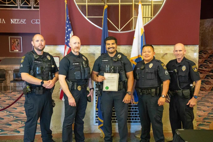 Officer Aguero poses with training staff and municipal court officers.
